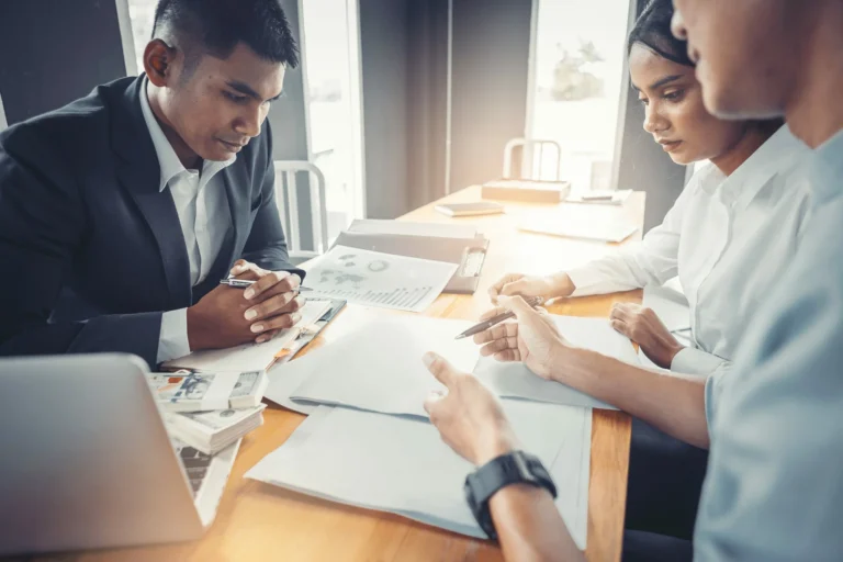 people working up a banking contract directly with their bank