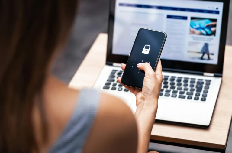 woman entering passkey before paying on phone showing strong customer authentication.